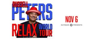 Russell Peters in a red hat promoting his RELAX world tour Russell Peters in a red hat promoting his RELAX world tour